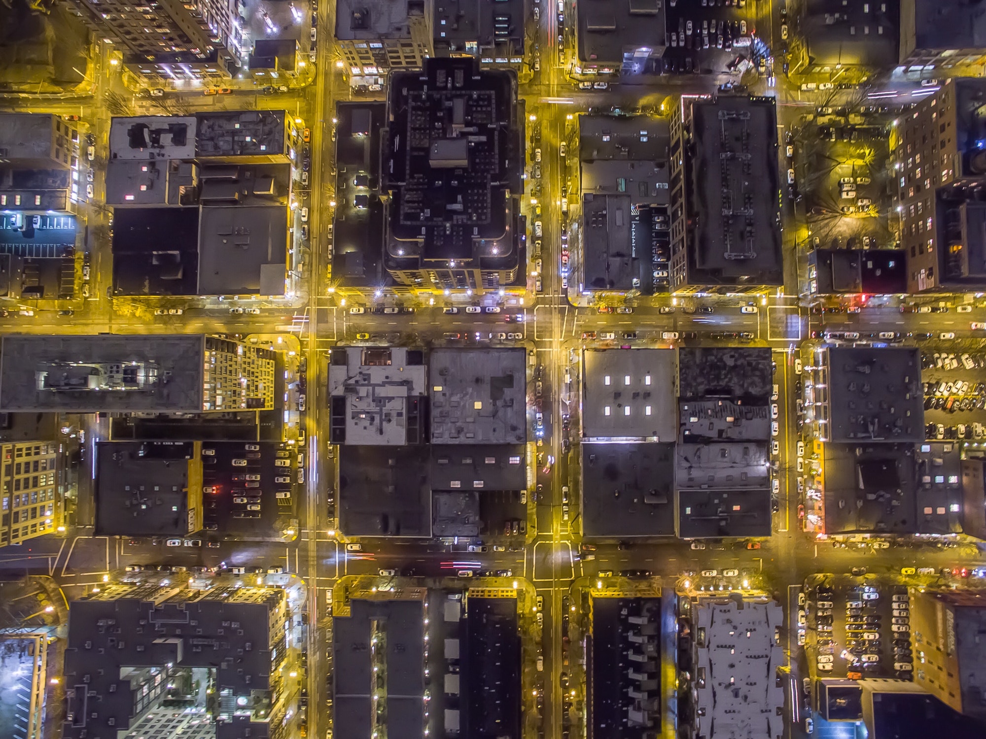 City from above at night looking straight down from drone